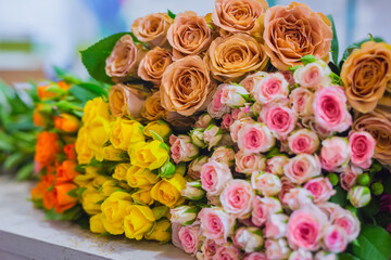 Colorful beautiful flowers bouquet - roses at studio, flower shop - close up view. Floristry, romantic, holiday, birthday, valentine day, wedding, celebration concept