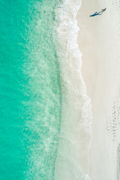 Aerial image of person on sandy beach