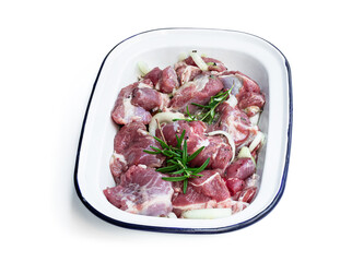 Marinated lamb slices with onion and spices isolated on white