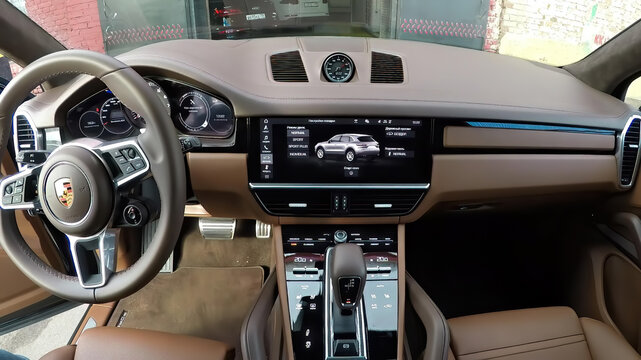 Moscow, Russia - October 10, 2018: Brown leather interior of new premium suv Porsche Cayenne 2019