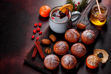 Beautiful delicious fresh cocoa muffins on the Christmas table