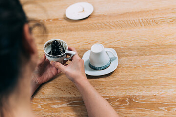 Turkish coffee fortune telling, over the shoulder view