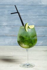 Cocktails and soft drinks. Fruit juice cocktail drink. assorted cocktail drinks. Different cold refreshing cocktails on wooden table