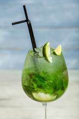 Cocktails and soft drinks. Fruit juice cocktail drink. assorted cocktail drinks. Different cold refreshing cocktails on wooden table