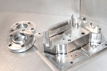 Metal mold and steel flanges. Milling industry. CNC technology.
