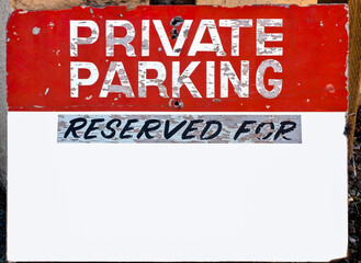 PRIVATE PARKING RESERVED FOR sign with copy space below.