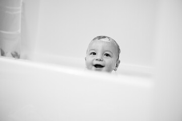 Happy Smiling Baby in Clean Bathtub