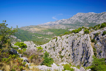 Dalmatian coastline mountains near Omis. Sunny day with blue sky