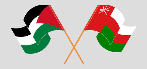 Crossed and waving flags of Palestine and Oman