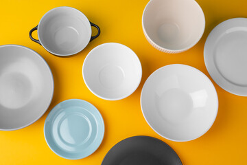 Top view on assorted plates and bowls