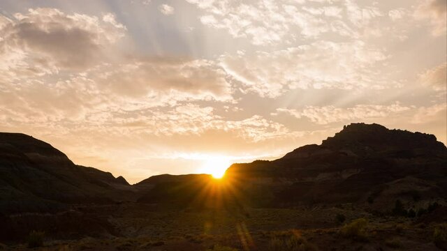 Time lapse of epic sunset sky over sandstone formation at Paria Historic Site in Utah