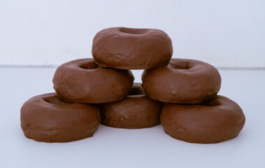 Chocolate donuts on a white background. Horizontal set. 