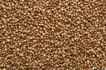 Buckwheat. The concept of diet and healthy eating, the background texture of the buckwheat. Macro photography of buckwheat texture.gluten free ancient grain for healthy diet,top view.