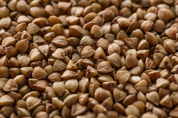 Buckwheat. The concept of diet and healthy eating, the background texture of the buckwheat. Macro photography of buckwheat texture.gluten free ancient grain for healthy diet,top view.