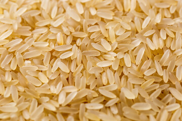 brown rice.The concept of diet and healthy eating, the background texture of the rice. Macro photography of brown rice texture.gluten free ancient grain for healthy diet,top view.