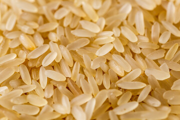 brown rice.The concept of diet and healthy eating, the background texture of the rice. Macro photography of brown rice texture.gluten free ancient grain for healthy diet,top view.