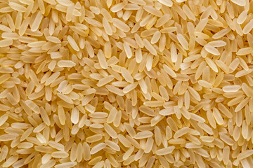brown rice.The concept of diet and healthy eating, the background texture of the rice. Macro photography of brown rice texture.gluten free ancient grain for healthy diet,top view.