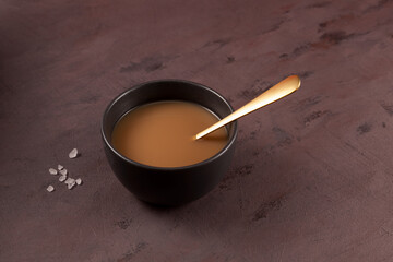 Traditional Tibetan butter tea or churned tea. Asian drink known as 