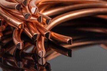 Cut copper wire closeup, component of metal and energy industry