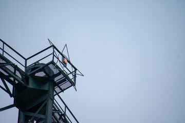 Gasometer closeup telephoto tower on a cloudy day in Schoneberg Berlin Germany