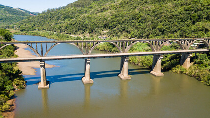 Muçum Bridge - Trigo Railway. Aerial view of the Brochado da Rocha railroad bridge and Taquari river in Rio Grande do Sul