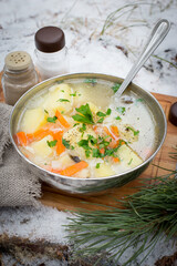 Fresh fish soup with spices, cooked over a fire. Taken on the nature of the fish soup. The view from the top.