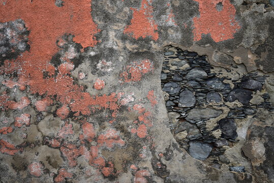 old wall with fallen off plaster