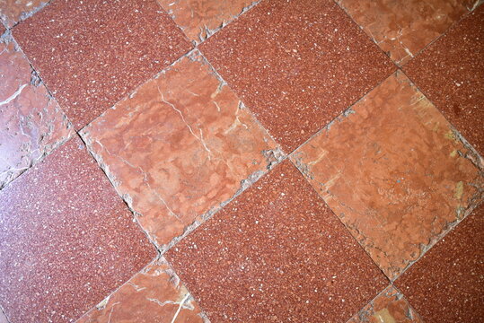 shabby floor paved with granite