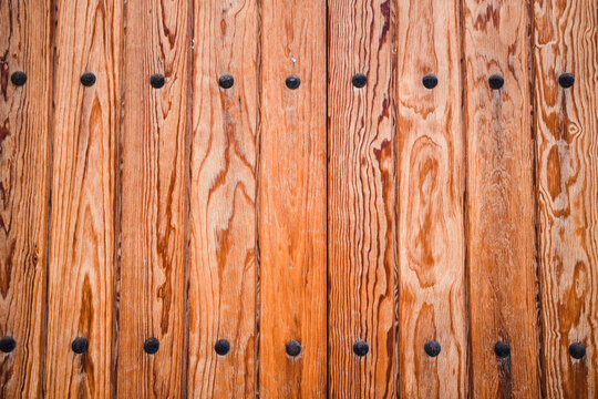 textured wood planks with metal rivets