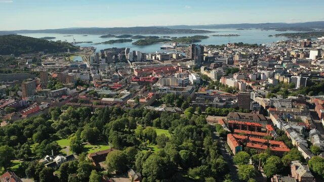 Oslo, Norway. Beautiful 4K panoramic aerial video from flying drone to Oslo city center. Against the background of the sea, mountains and blue sky on a sunny summer day. (Series)