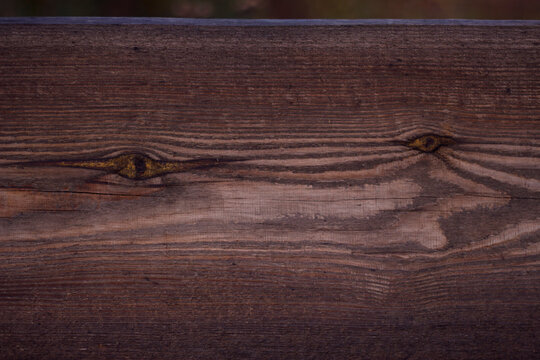 old wooden plank with eyes drawing texture