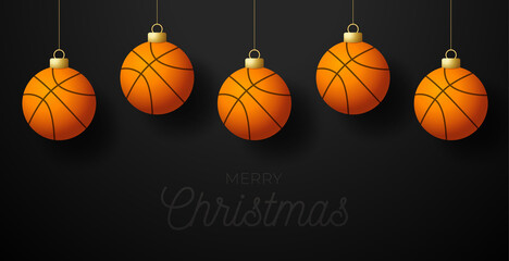 Merry Christmas Basketball greeting card. Hang on a thread Basketball ball as a Christmas ball on black horizontal background. Sport Vector illustration.