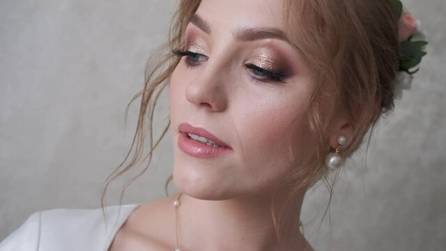 portrait video of a beautiful girl. beautiful bride. a girl with a beautiful smile and eyes
