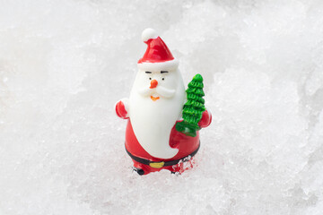 Santa claus on snow christmas day and happy new year