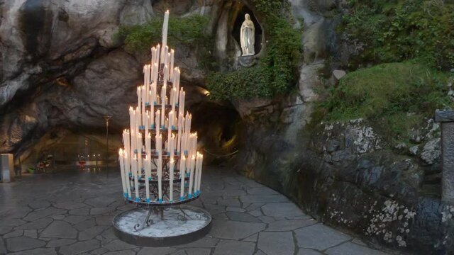 The Grotto of Massabielle is the place where the Virgin appeared to Bernadette Soubirous, a 14-year-old girl, from Lourdes, France, in 1858. At the back left of the Grotto is the Spring.