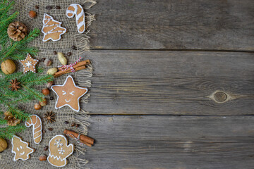 Christmas background with cookies and a tree branch there is space for text. Top View Flat Layout
