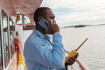 Sailor on deck talking on his phone