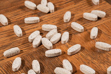 Collagen Protein - Hydrolyzed - Collagen Capsules - Collagen on wooden background.