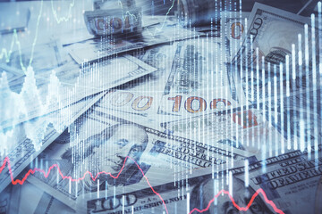Multi exposure of forex chart drawing over us dollars bill background. Concept of financial success markets.