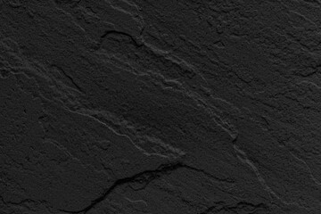 Dark grey black slate background or texture. Black granite slabs background