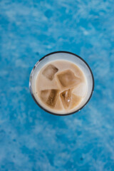 iced coffee with almon milk in tall glass