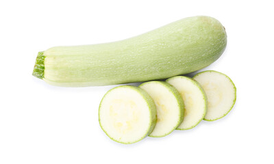 Cut and whole green ripe zucchinis on white background, top view