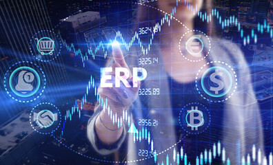 Business, Technology, Internet and network concept. Young businessman working on a virtual screen of the future and sees the inscription: ERP