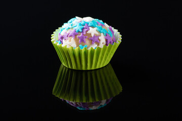 Traditional Brazilian sweet. Party candy isolated on black background.