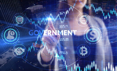 Business, Technology, Internet and network concept. Young businessman working on a virtual screen of the future and sees the inscription: Government