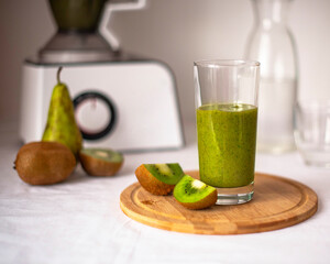 Green smoothie of pear and kiwi. the concept of a healthy diet. Detox