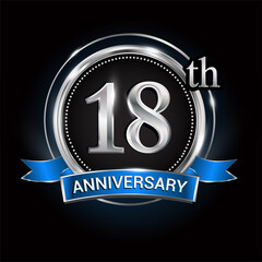 Celebrating 18th anniversary logo. with silver ring and blue ribbon.