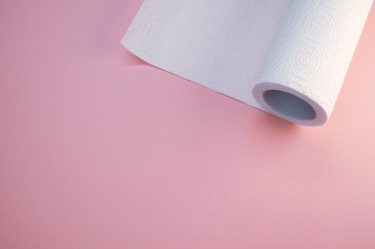 Kitchen Paper Roll On A Pink Background