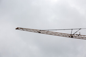 Crane at work and cloudy sky