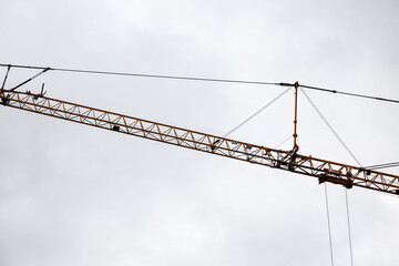 Crane at work and cloudy sky